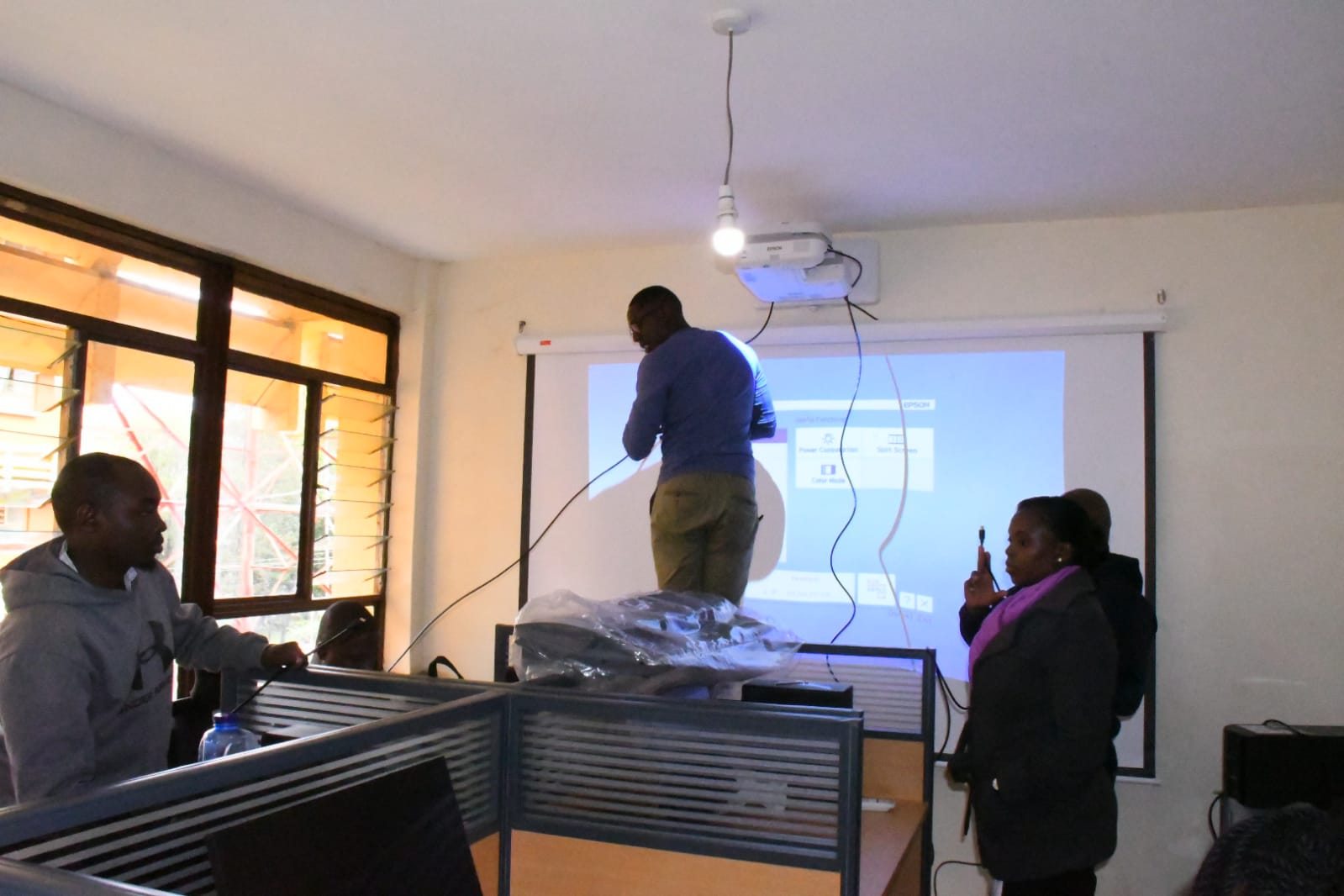 Technicians from FAO and EU installing software to digitize Land  records in the County