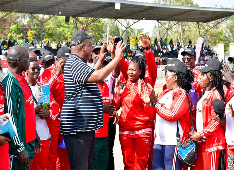 Governor Amos Nyaribo joins Nyamira County participants during Kicosca games in Kisumu County